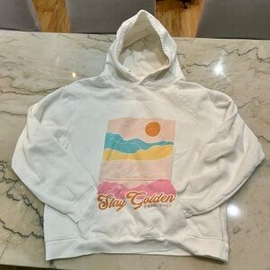 Pura Vida Cream Hoodie with ‘Stay Golden Pura Vida’ text
